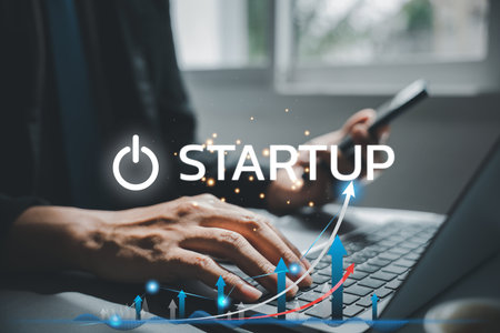 Start up for business success. Businessman using laptop with graph chart for business growth. Icon business and network connection on virtual interface for marketing strategy and investmentの写真素材