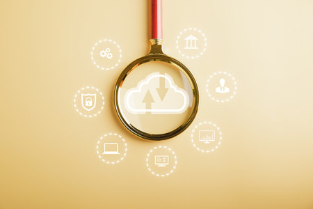 Magnifier glass reveals cloud computing, uploading and downloading data. Network application and digital solution. Cloud data storage, security, and backup. Technology evolution.の写真素材