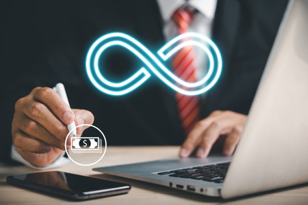 Businessman directs attention to infinity symbol, signifying limitless connection in data technology. Cyber space, future unlimited. Infinite power, energy, internet information. infinity dataの写真素材