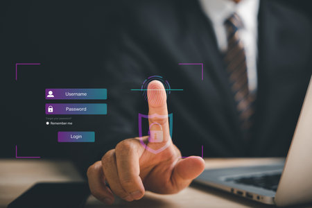 Futuristic biometric fingerprint scanning technology concept. Pointing finger on a digital screen...