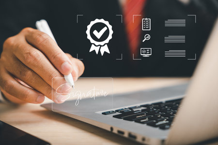 Paperless office concept Businessman utilizes pen to sign electronic documents on virtual screen. Highlights electronic signature technology and online document management (DMS).の写真素材