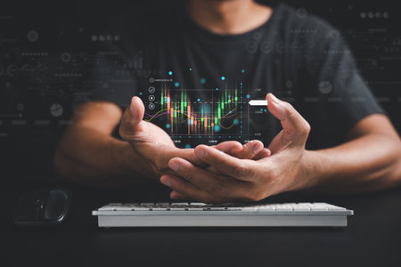 Trader or investor man presents a hologram of a growing stock chart on his palm in a close-up. Stock market data analysis, strategic planning, and business growth concepts. Empower your success.の写真素材