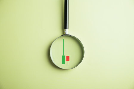 A magnifying glass providescloser look at stock markets bar graph, revealing upward trend and fueling traders business investment strategies. Technical price graph and indicatorの写真素材
