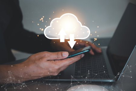 Cloud computing and networking technology concept. A man shows a digital screen with a cloud...