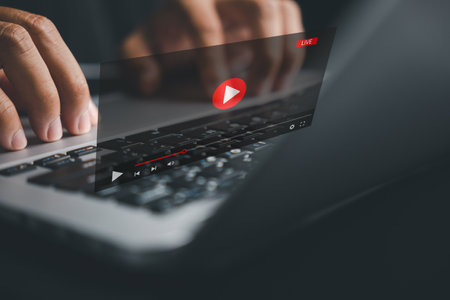 Discover the power of online streaming with a laptop. Watch videos, tutorials, and live events on popular platforms and websites. Expand your business and marketing skills.の写真素材