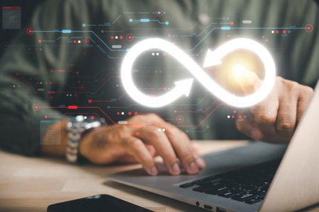 Businessman points at infinity symbol, illustrating limitless connection in data technology. Cyber space, future unlimited. Infinite power, energy, internet information. technology infinity dataの写真素材