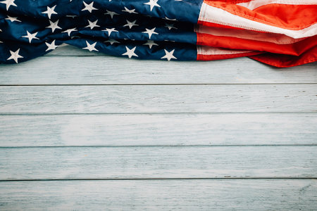 Veterans Day celebration concept, American flags on wooden background, symbolizing honor, pride, and...