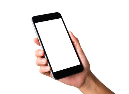 Woman hand holding a smartphone blank white screen. Female holds the modern mobile phone on hands studio shot isolated on over white background with clipping mask path on the phone and screenの写真素材