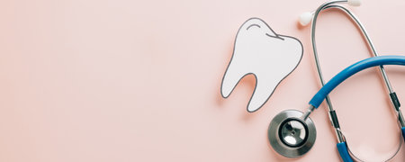 World Dentist Day mockup with tooth cutout and stethoscope on pink. Showcasing dental health, orthodontics, oral care, and health themes for postcards and awareness campaigns.の写真素材