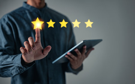 Customer satisfaction is key as a businessman adds a five star rating indicating best business...