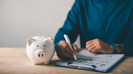 Piggy bank finance money documents save management check document shows person reviews financial...