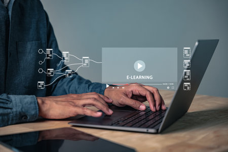 Learn digital skills and connect via e-learning, utilizing a video player on a laptop for online...
