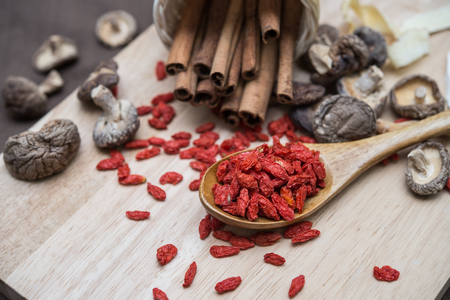 dried chili peppers on white backgroundの写真素材