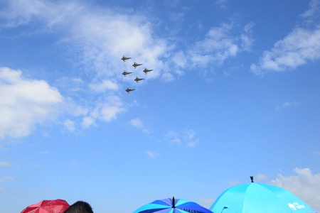 NAKHON RATCHASIMA 27 NOVEMBER :The display of aerobatics shared between the F-16, Gripen and August 1st Aerobatic team on of - China on Novemberber 27, 2015 in Nakhonratchasima Thailand.のeditorial素材