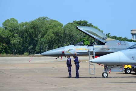 NAKHON RATCHASIMA 27 NOVEMBER :The display of aerobatics shared between the F-16, Gripen and August 1st Aerobatic team on of - China on Novemberber 27, 2015 in Nakhonratchasima Thailand.のeditorial素材