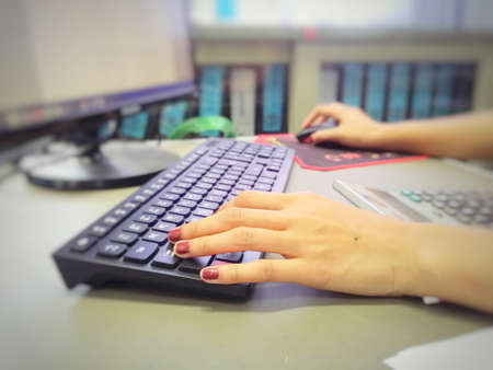Modern women work office and use computers to work.の写真素材