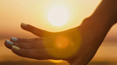 Wedding Ring Put On Finger Hands Touching Sunset Bride Groom Man Woman Marriage Proposal Vacation Honeymoon, silhouette, close upの写真素材