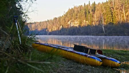 Raft on shore of mountain misty forest river, Ural, chusovaya, Russiaの写真素材