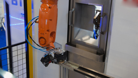 Automated robotic machine - mechanical arm for industrial welding, close upの写真素材