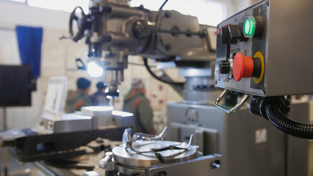 lathe machine at factory - machinery industry, close up view