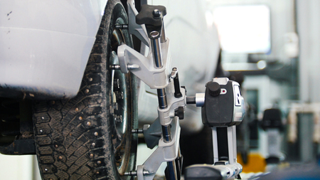 Lifted car in professional service - the collapse of convergenceの写真素材