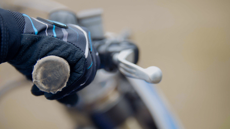 Cross motorcycle engine start. MX, close up shot of hand on handlebarの写真素材