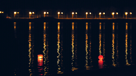 Lighting water Lanterns on river at nightの写真素材