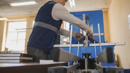 Employee of a printing company at work