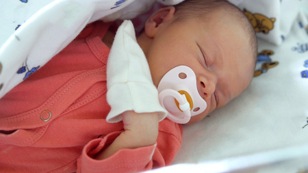 Maternity hospital - a newborn baby is sleeping