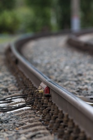 Curving railway metal tracks, close upの写真素材