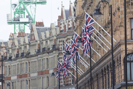A lot of british union jack flag on the street of londonの写真素材