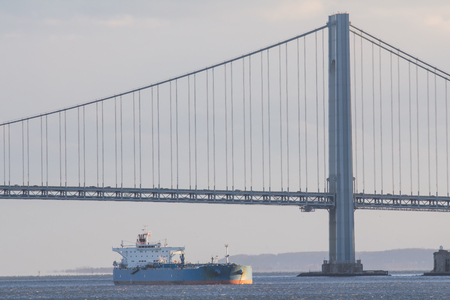 Massive Tanker under Nye York Bridgeの写真素材