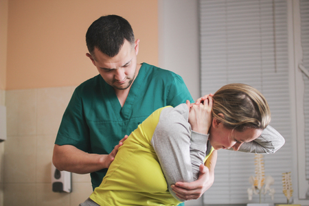 Neuropathology - doctor osteopath have manual therapy for womans neckの写真素材