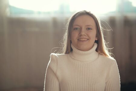 Portrait of a caucasian beautiful smiling girl