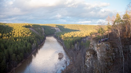 Fascinating view overlooking the mountain river and dense forestの写真素材