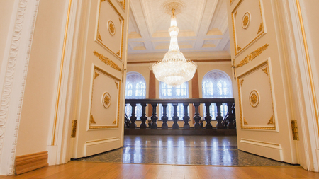 KAZAN, RUSSIA - MARCH 30, 2018:, ladder in City Hall - luxury ballroom - preparing for historical dance partyのeditorial素材