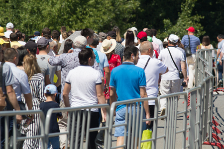 KAZAN, RUSSIA - JUNE 23, 2018: Traditional Tatar festival Sabantuy - many people walking at celebration in summer parkのeditorial素材