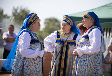 20 August 2018, Krasnovidovo, Russia - mature women in folk costumeのeditorial素材