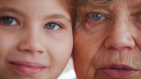 Close up portrait of grandmother and granddaughterの写真素材