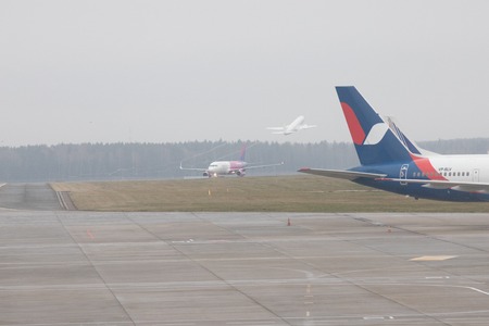 DOLOMITES, ITALY. 8-11-18 - Departure lounge at the airport. Landing field. Airplane tailのeditorial素材