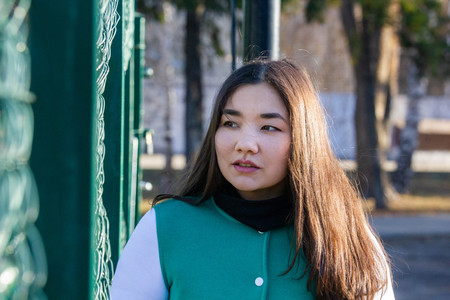 Young woman standing in a sport costume. Portraitの写真素材