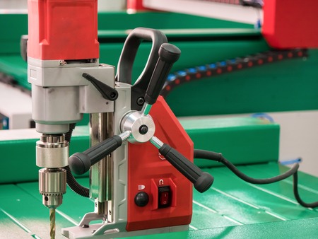 Automated CNC equipment for working with metal at factory. Electro drill machine. The programmed...