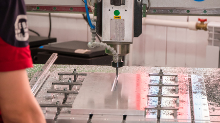 Automated CNC equipment for working with metal in action. The programmed robot head.の写真素材