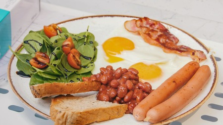 An english breakfast. Beautiful serving. Close upの写真素材