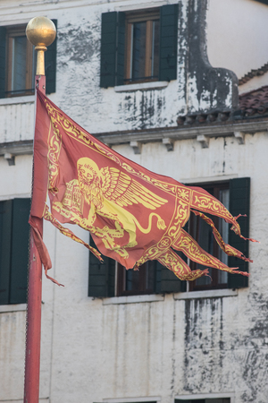 flag of Venice, main symbol of Venice - the golden winged lion of Evangelist Markの写真素材