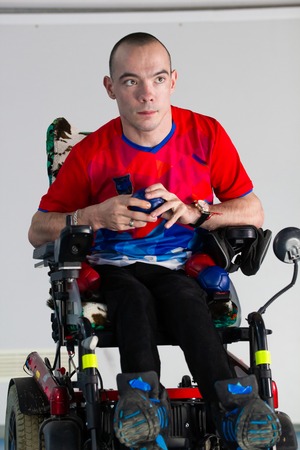 Boccia. A disabled athlete man sitting in a wheelchair.の写真素材