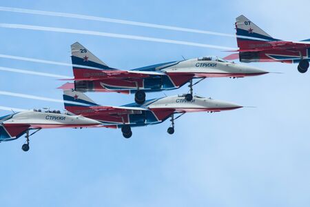 Kazan, Russian Federation - Oktober 27, 2018: Aerobatics performed by aviation group Strizhi . Telephoto shotのeditorial素材