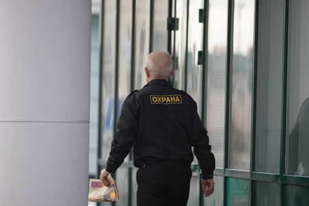 RUSSIA, KAZAN 10-04-2019: Urban streets. A security guard man in the uniformのeditorial素材
