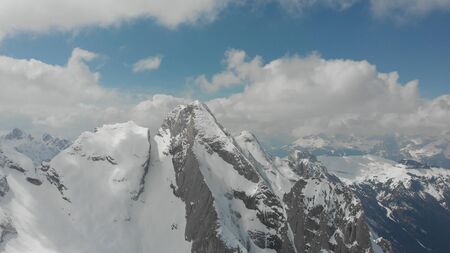 Beautiful snowy summits of mountains in Dolomites, Italy