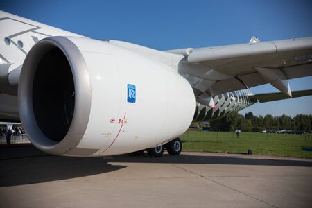 30 AUGUST 2019 MOSCOW, RUSSIA: Huge turbine of big airplane on the side of the passenger plane -...